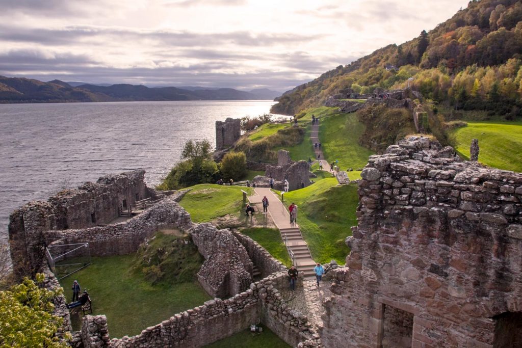 View of an ancient castle ruin on the shores of a Scottish loch.