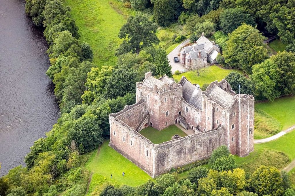 An aerial view of Doune Castle near St. Andrews, Scotland, in the summer.