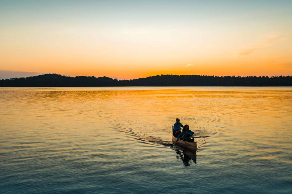 Two women canoeing in the Minnesota Boundary Waters, totally off-the-beaten-path.